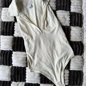 Elegant Cream Women's Bodysuit